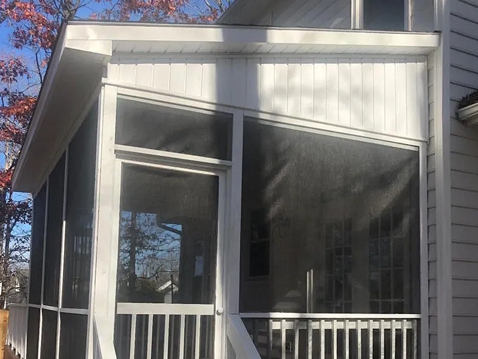 beautiful screened in porch built as part of patio, porch and deck reconstruction