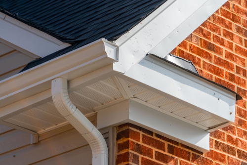 gutters and soffit on a home with gutter and siding installation services