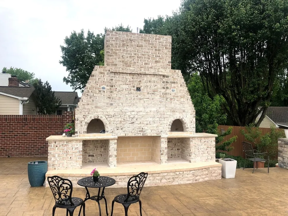 beautiful stone patio built by a porch, patio, and deck construction company